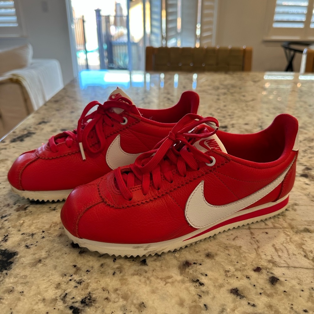 Red Nike Cortez.
